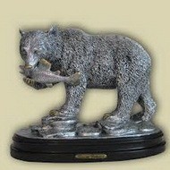 Статуэтка из серебра медведь